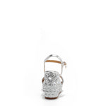 The platform  wedge is adorned with silver rhinestones and  braid detailing.