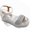 Kali Espadrille Wedge sandal in Silver.  Fitted with 1 adjustable buckle. .The insole is gold with the Nicole Lee logo. Top strap is embellished with rhinestones.