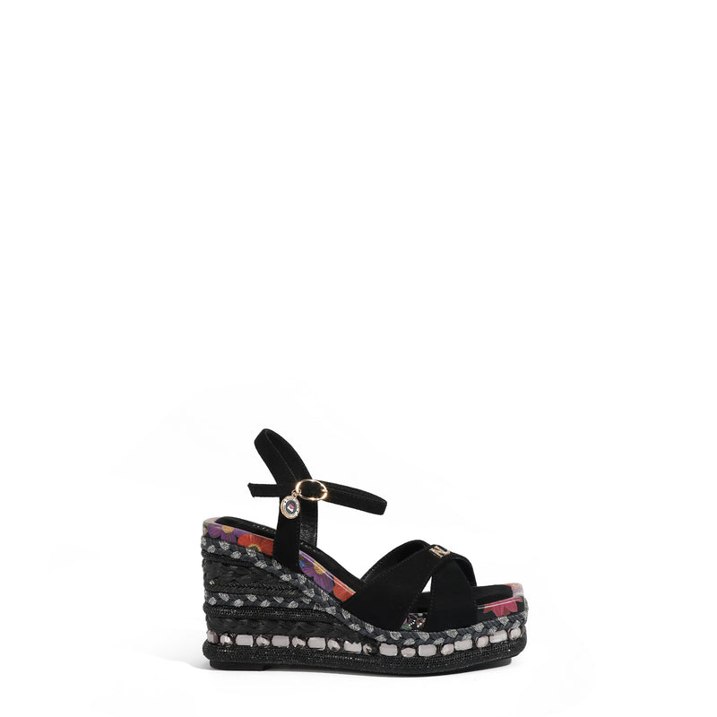 BONNIE ESPADRILLE WEDGE SANDAL IN BLACK COLOR. FEATURING A STUNING  MIX OF  MATERIAL SUCH AS WOVEN, RHINESTONES AND FLORAL PRINT ON HE EDGE OF THE INSOLE. CRISSCROSS SUEDE STRAPS. ADJUSTABLE ANKLE STRAP WITH A NICOLE LEE CHARM. 