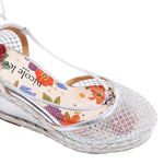 MAYA WRAP ESPADRILLE WEDGE SANDAL FRONT VIEW. REFINED RHINESTONE MESH CLOSED TOE CAP WITH A FLORAL PRINT INSOLE.