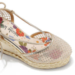 MAYA WRAP ESPADRILLE WEDGE SANDAL FRONT VIEW. REFINED RHINESTONE MESH CLOSED TOE CAP WITH A FLORAL PRINT INSOLE.
