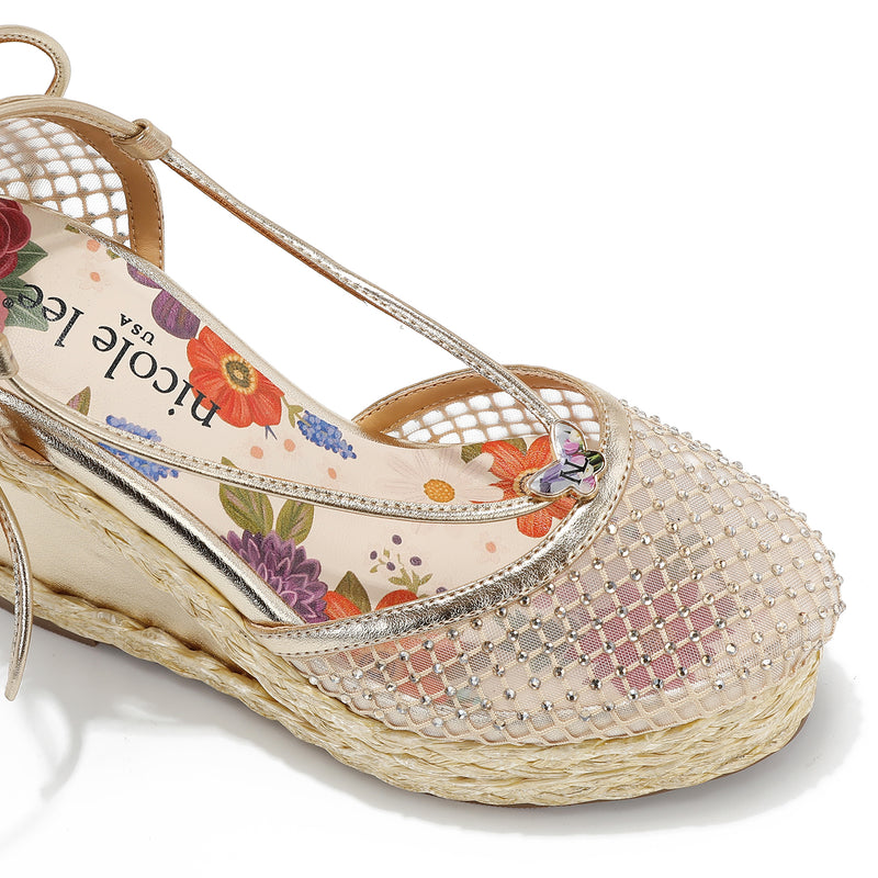 MAYA WRAP ESPADRILLE WEDGE SANDAL FRONT VIEW. REFINED RHINESTONE MESH CLOSED TOE CAP WITH A FLORAL PRINT INSOLE.