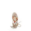 MAYA WRAP ESPADRILLE WEDGE SANDAL FROM A VIEW FROM ABOVE. FEATURES RHINESTONE MESH TOE CAP. TWO STRAPS THAT ARE TIED IN A BOW SHAPE.  THE INSOLE HAS A FLORAL PRINT.