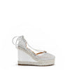 MAYA WRAP ESPADRILLE WEDGE SANDAL IN COLOR SILVER. RHINESTONE MESH TOE CAP AND A BRAIDED TRIM PLATFORM. IT HAS TWO STRAPS WHERE YOU CAN TIE IT ON THE BACK OF THE ANKLE.