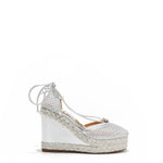 MAYA WRAP ESPADRILLE WEDGE SANDAL IN COLOR SILVER. RHINESTONE MESH TOE CAP AND A BRAIDED TRIM PLATFORM. IT HAS TWO STRAPS WHERE YOU CAN TIE IT ON THE BACK OF THE ANKLE.
