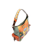 Our Sun and sand Hobo bag with a tropical design featuring palm trees and a beach hut.
