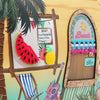 Sun and Sand Tropical-themed door with 'Life is Better at the Beach' sign, watermelon, pineapple, and deck chair.