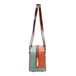 Our Sun and Sand Shoulder Handbag. Side view set on a white background