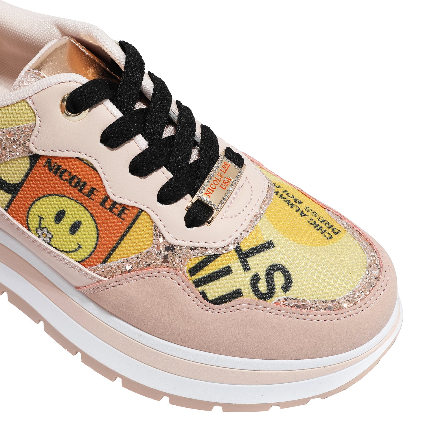 A CLOSER LOOK TO THE FRONT OF NAIL POLISH FASHION GLITTER SNEAKERS. PEACHY COLOR WITH BLACK LACES IN OUR NAIL POLISH DESING 